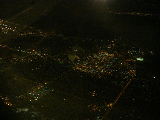 View out the window seat at night (a city?)