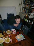 Larry blows out the candles