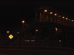Railroad pedestrian bridge at night